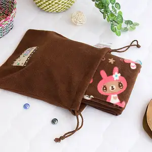 Photo of Brown Dancing Bear - Fleece Throw Blanket In A String Bag