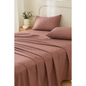 Photo of Four Piece Pink Cotton King Sheet Set