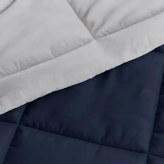 King/Cal King 3-Piece Microfiber Reversible Comforter Set in Navy/Grey Photo 3