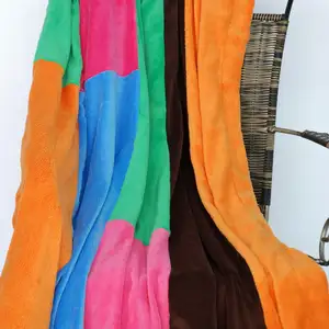 Photo of Onitiva - Colorful Patchwork - Soft Coral Fleece Patchwork Throw Blanket (59 by 78.7 inches)