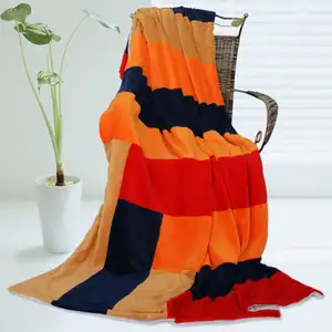 Photo of Onitiva - New Day - Soft Coral Fleece Patchwork Throw Blanket (59 by 78.7 inches)