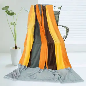Photo of Onitiva - New Hope - Soft Coral Fleece Patchwork Throw Blanket (59 by 78.7 inches)