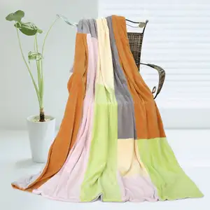 Photo of Onitiva - Paradise - Soft Coral Fleece Patchwork Throw Blanket (59 by 78.7 inches)