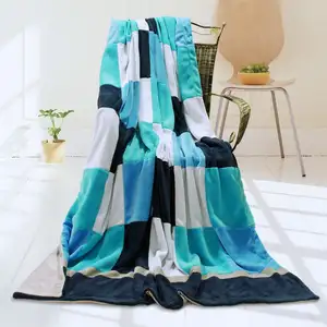 Photo of Onitiva - Plaids - Coral Sea - Soft Coral Fleece Patchwork Throw Blanket (59 by 78.7 inches)