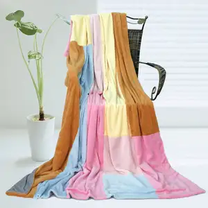 Photo of Onitiva - Spring Breeze - Soft Coral Fleece Patchwork Throw Blanket (59 by 78.7 inches)