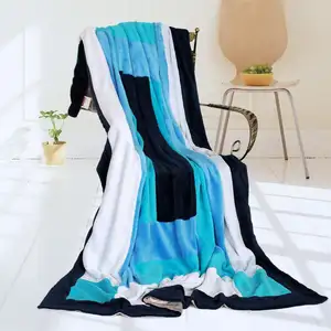 Photo of Onitiva - Wild Ocean - Soft Coral Fleece Patchwork Throw Blanket (59 by 78.7 inches)