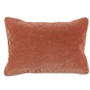 Photo of Rectangular Fabric Throw Pillow with Solid Color and Piped Edges, Terra Cotta